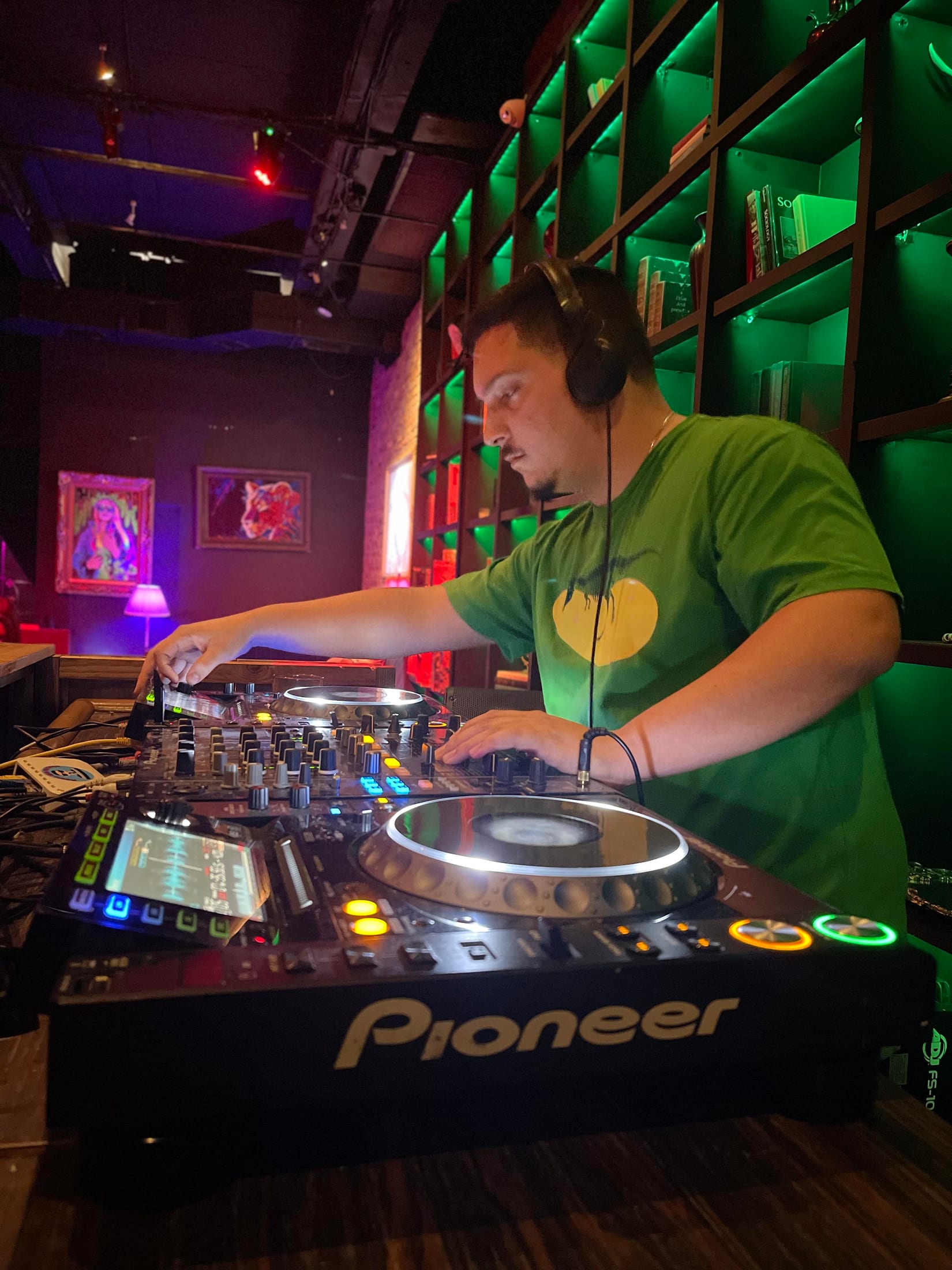 DJ selecting music and preparing the next track