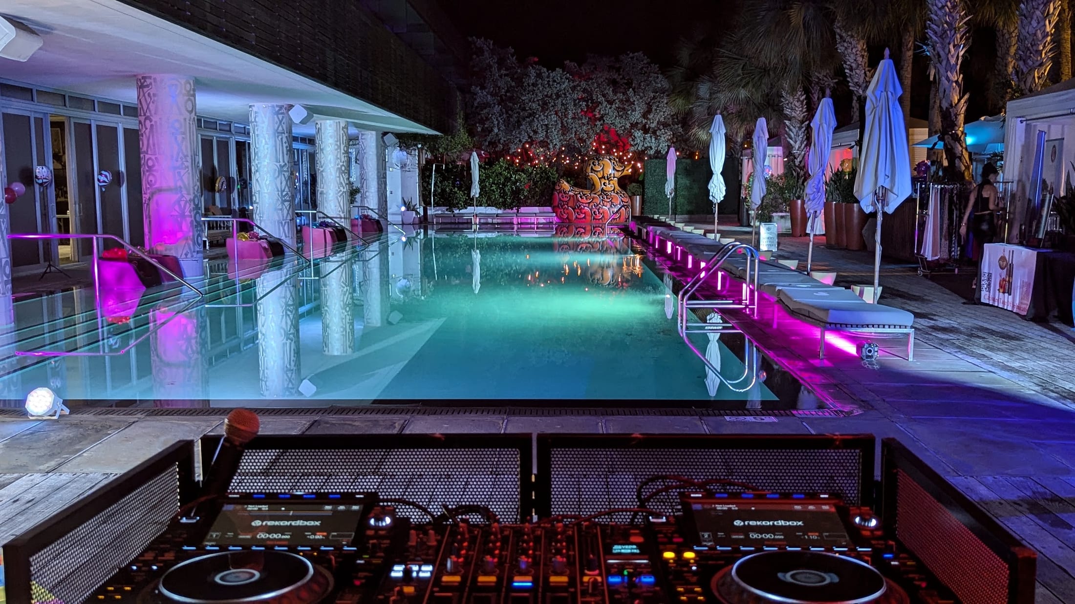 Professional DJ setup overlooking a South Beach event