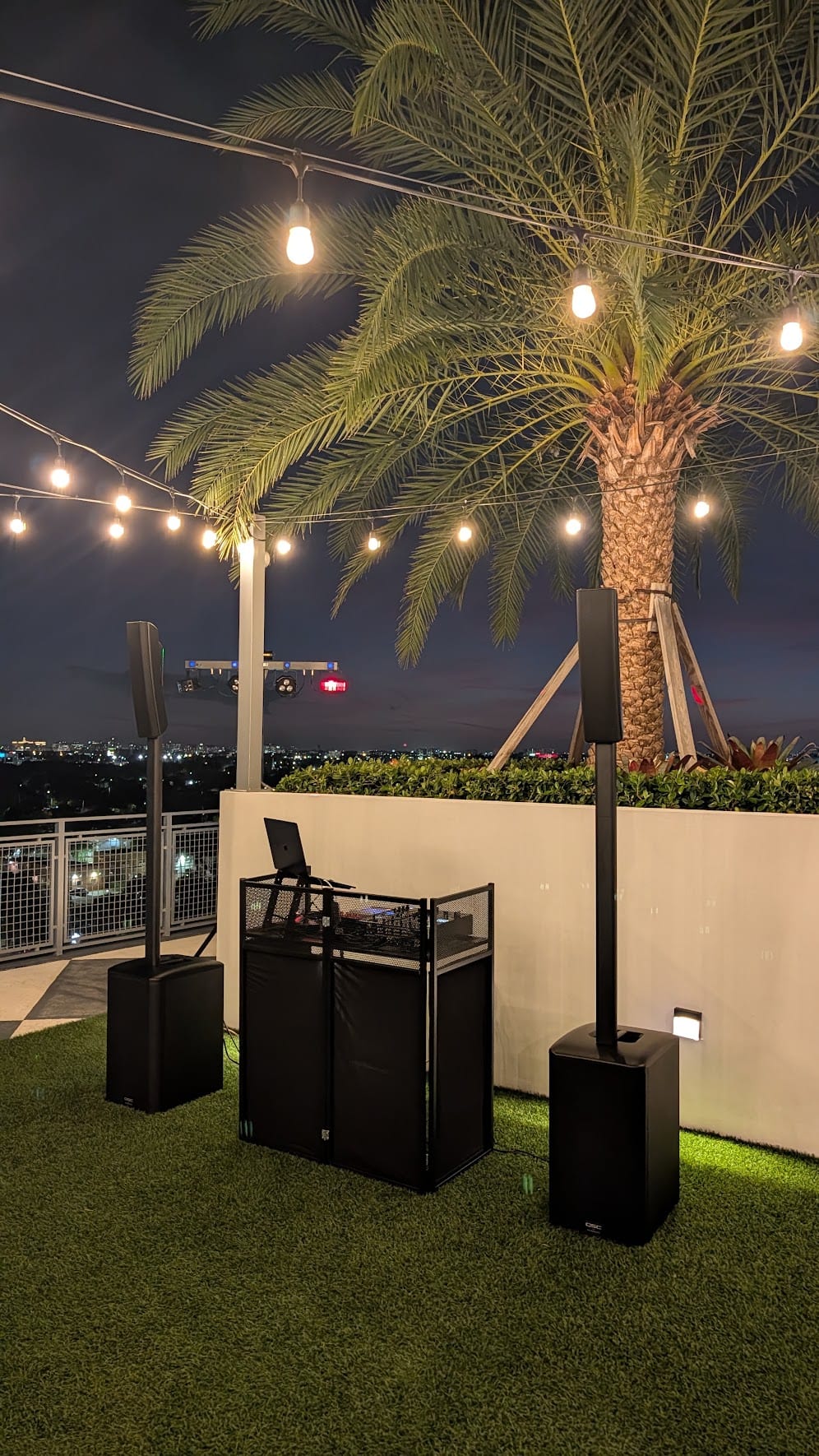 PSYBER DJ and sound system set up for a rooftop event
